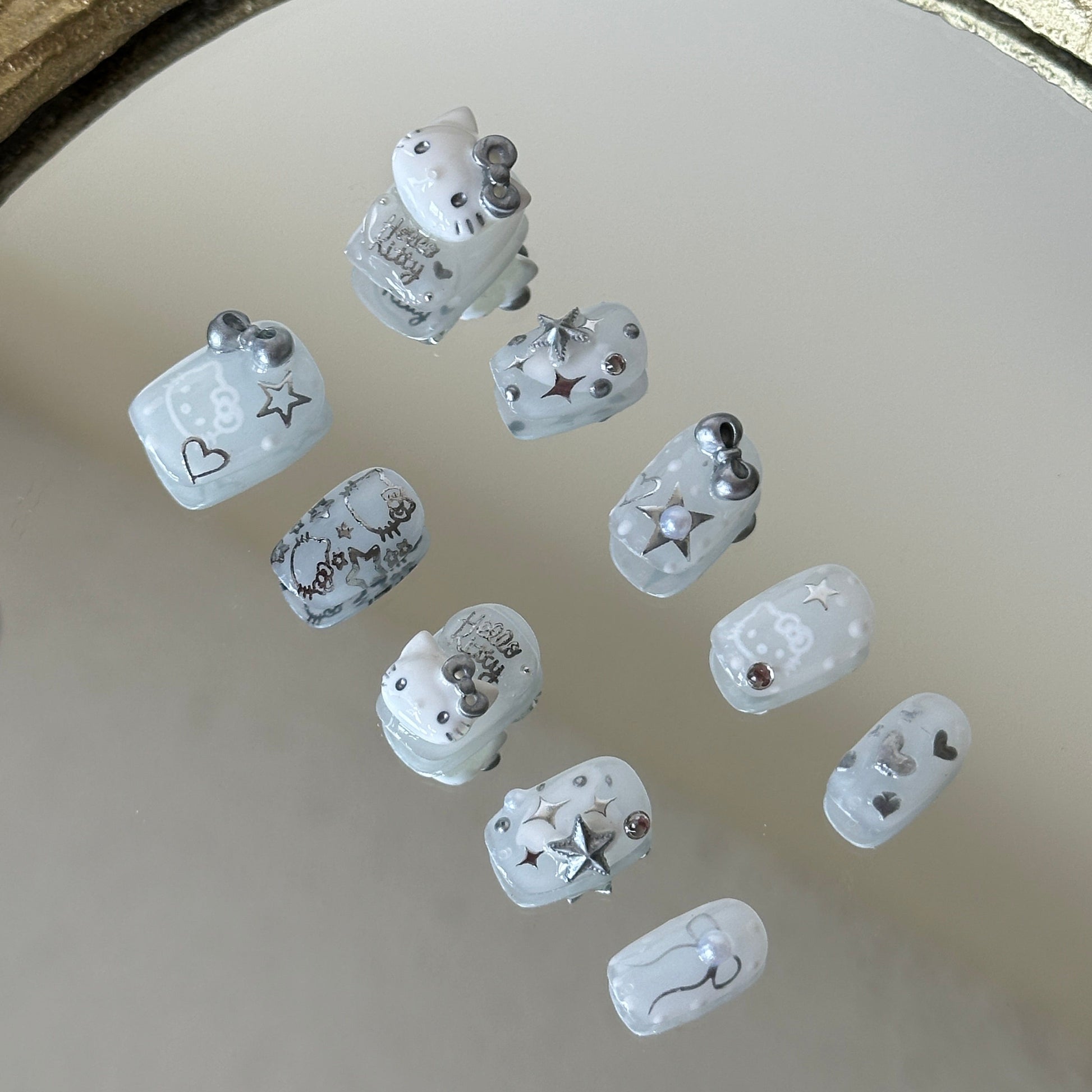 Right side view showcasing the whimsical feline character silhouettes and silver star stickers.