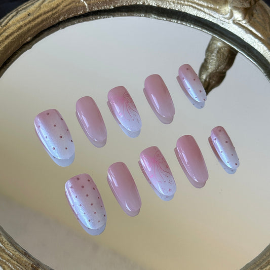 Close-up detail of the luminous white aurora powder over a soft pink-white gradient by MYOB Nails.
