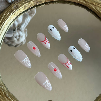 Left side detail of MYOB Nails Spooky Webs set highlighting the realistic 3D crimson blood-drip and waterdrop effects.