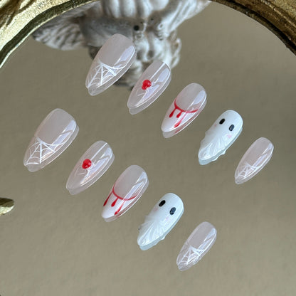 Right side view of Spooky Webs nails by MYOB Nails featuring the translucent and expressive 3D handcrafted ghost figures.