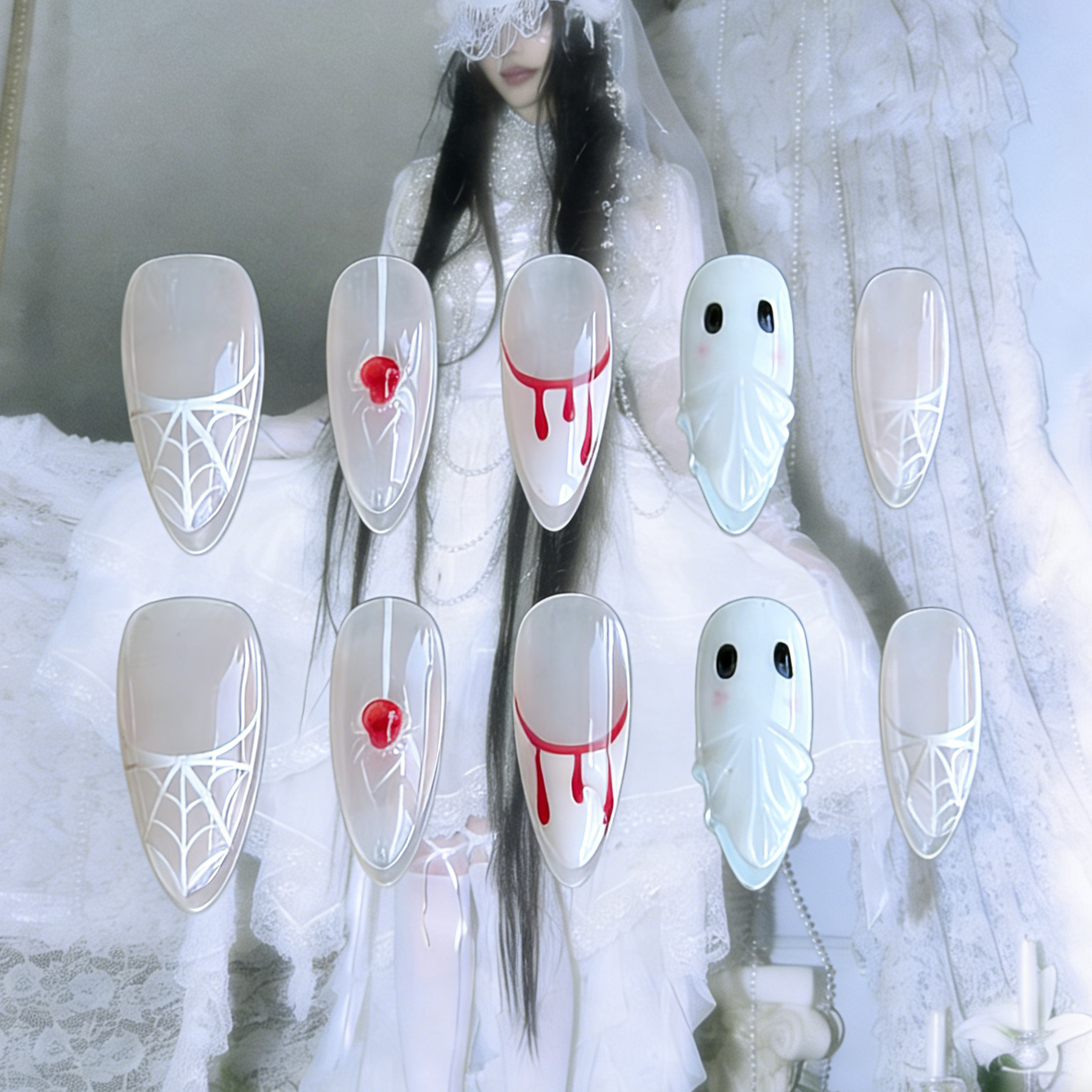 Spooky Webs press-on nails by MYOB Nails featuring white ghost and blood-drip designs against a gothic bridal lace background.