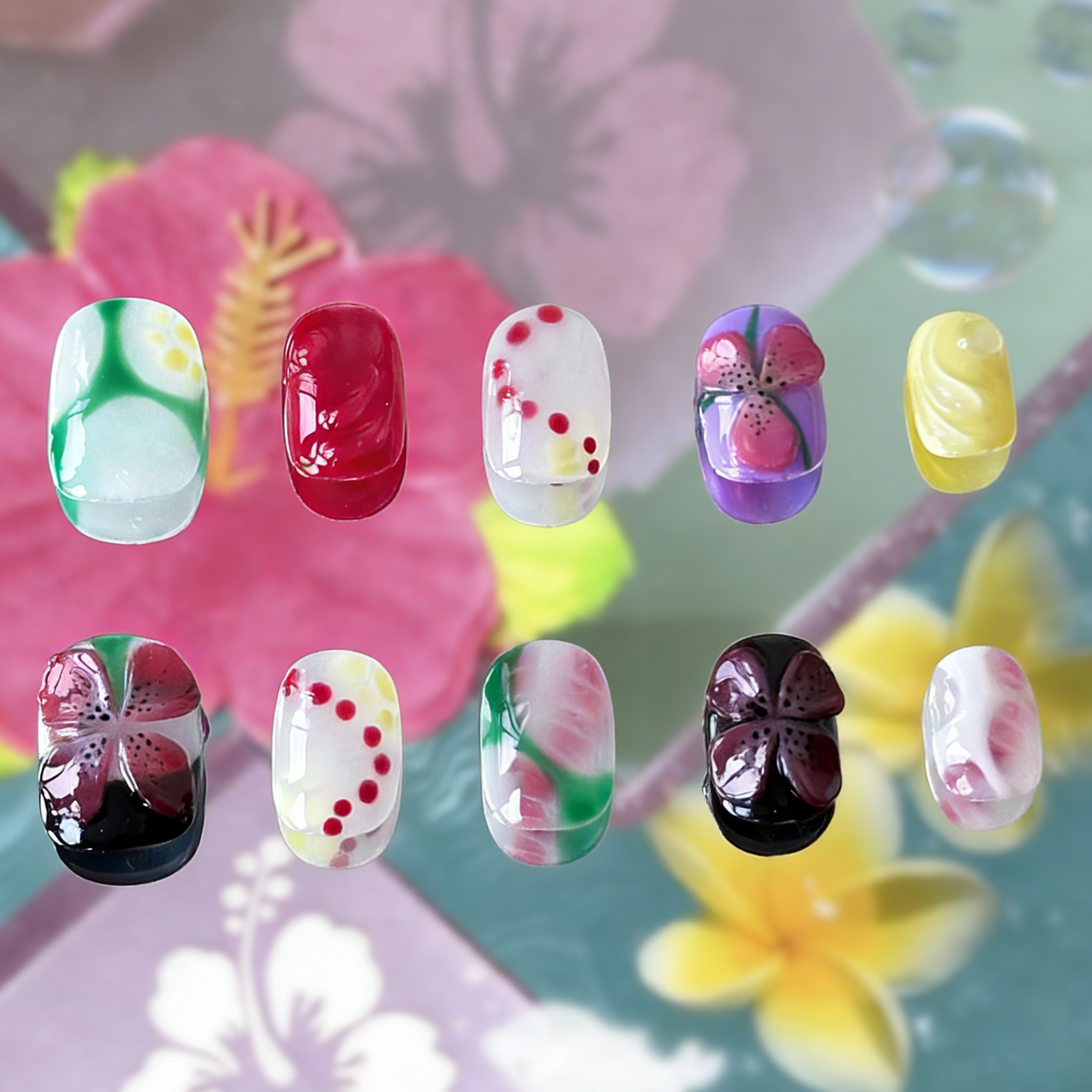 Tropilush press-on nails by MYOB Nails featuring colorful 3D tropical flowers and vibrant blush gradients.