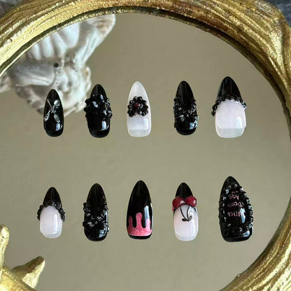 Back view of the Witches Don't Age handcrafted nail set by MYOB Nails, showcasing a mysterious and luxurious dark coquette aesthetic.